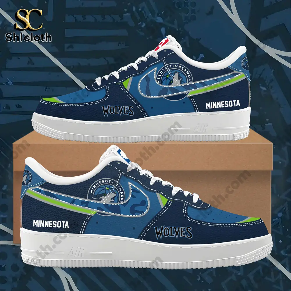 Close up view of blue Minnesota themed sneakers with detailed graphic elements.