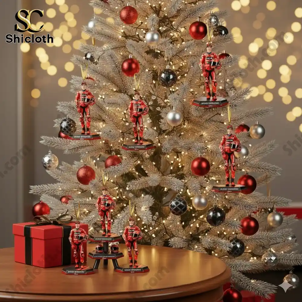 A collection of Marc Márquez ornaments hanging on a Christmas tree, with a few on a table.
