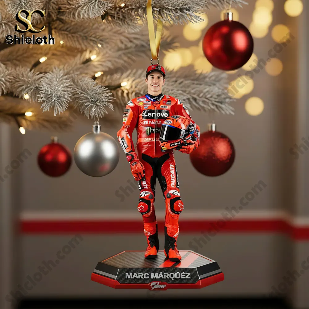 Marc Márquez ornament hanging on a Christmas tree with a festive background.