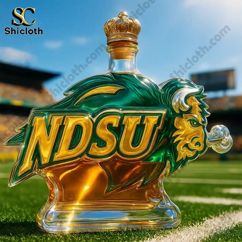 An NDSU themed bottle with a crown style cap displayed on a football field.