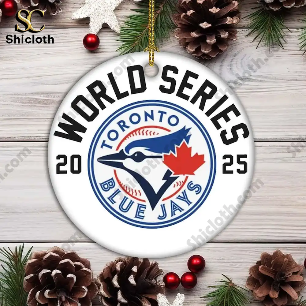 Close up of a Toronto Blue Jays World Series round ornament with team logo hanging on a wooden background by Shicloth!