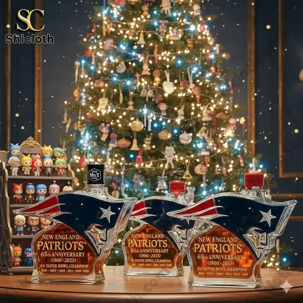Patriots logo shaped bottles displayed in front of a decorated Christmas tree.