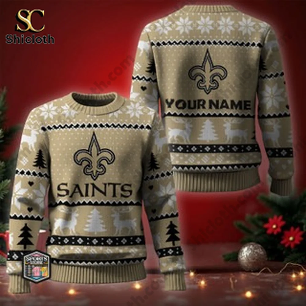 A beige Saints sweater with a holiday design featuring a tree, reindeer, and personalized name on the back.