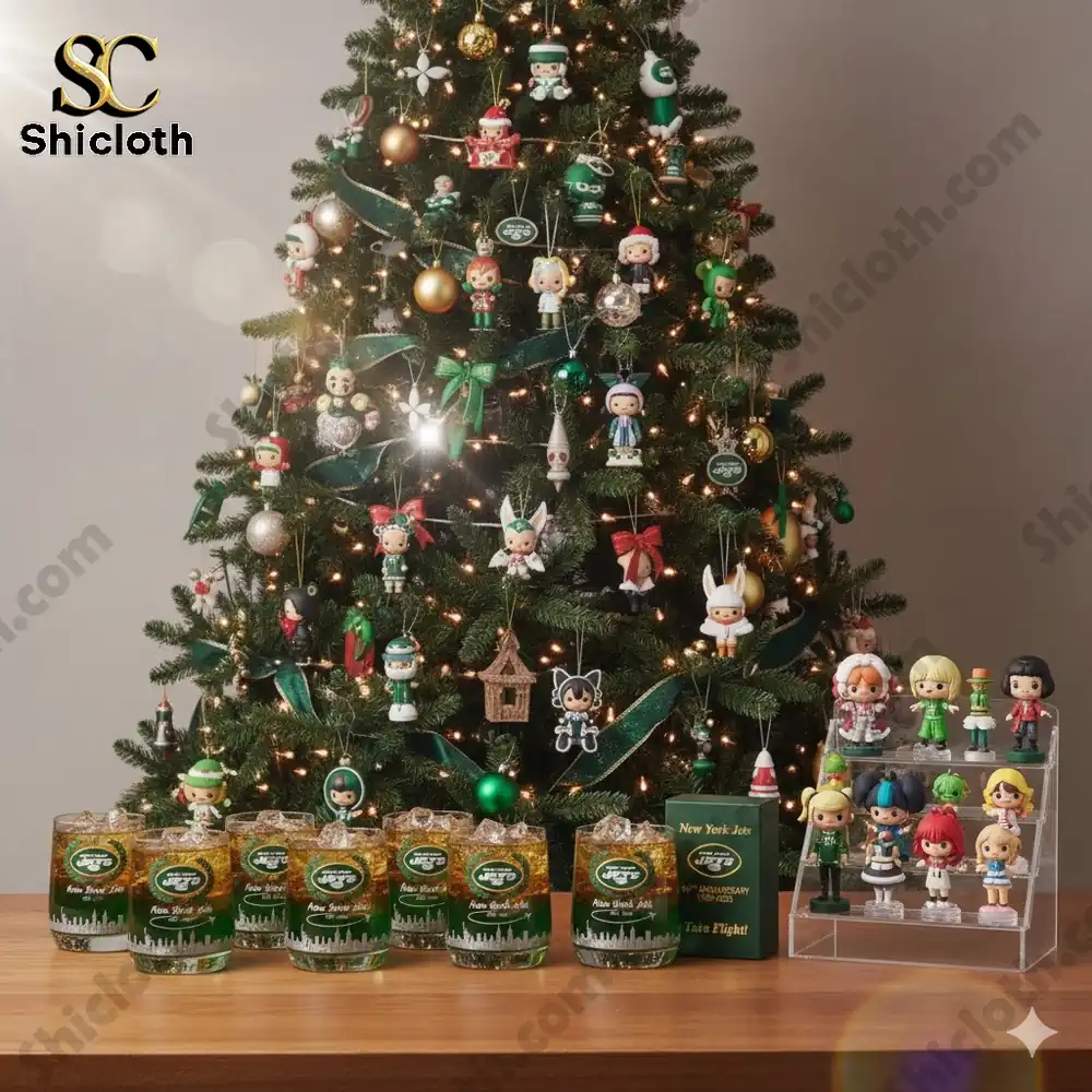 A decorated Christmas tree with themed ornaments and collectible items displayed on a wooden table.