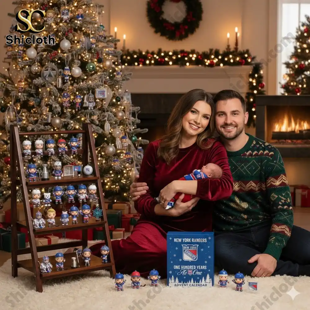 A family poses in front of a Christmas tree holding a New York Rangers Advent Calendar and collectible figurines!