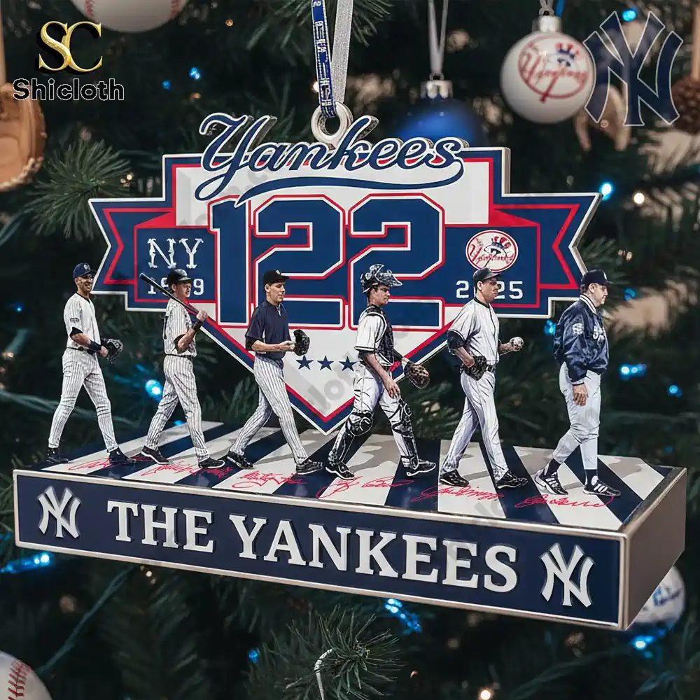Close-up of a New York Yankees 122nd Anniversary acrylic ornament featuring player figurines.