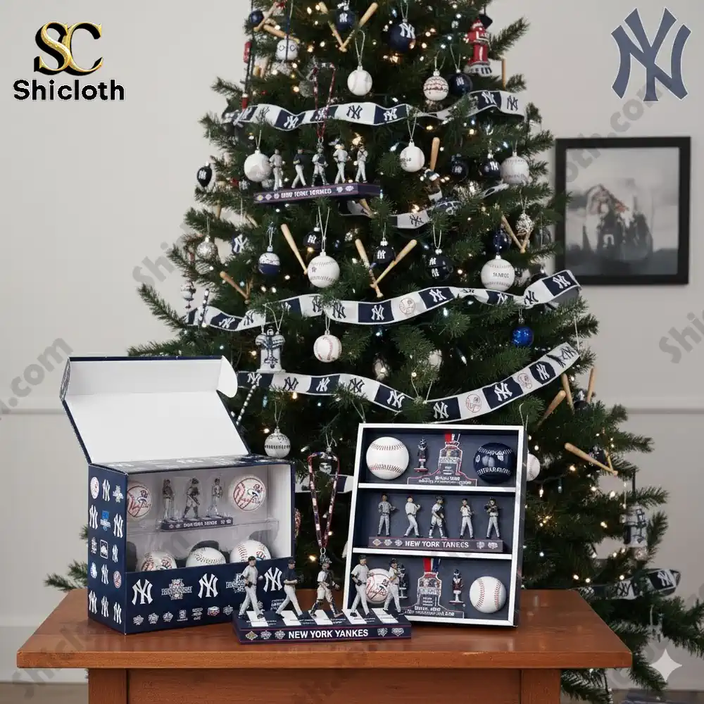 New York Yankees Christmas tree ornament display featuring figurines and baseball decorations.