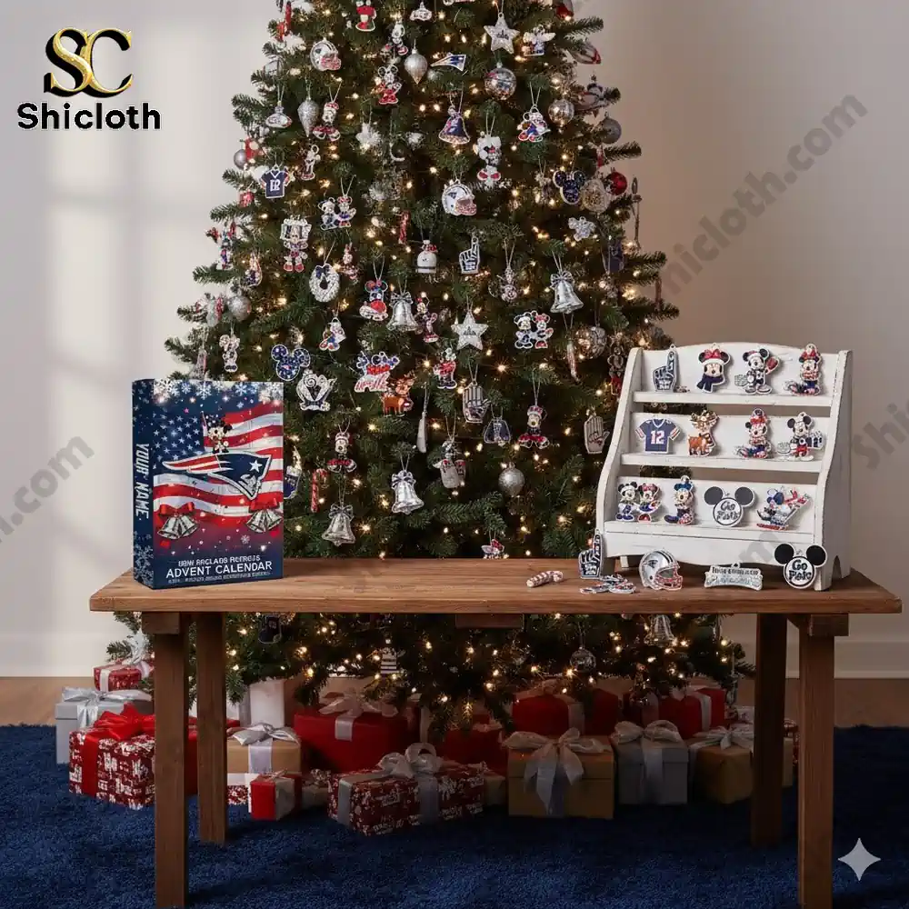 A Christmas tree filled with New England Patriots ornaments with the Advent Calendar box displayed on a wooden table.