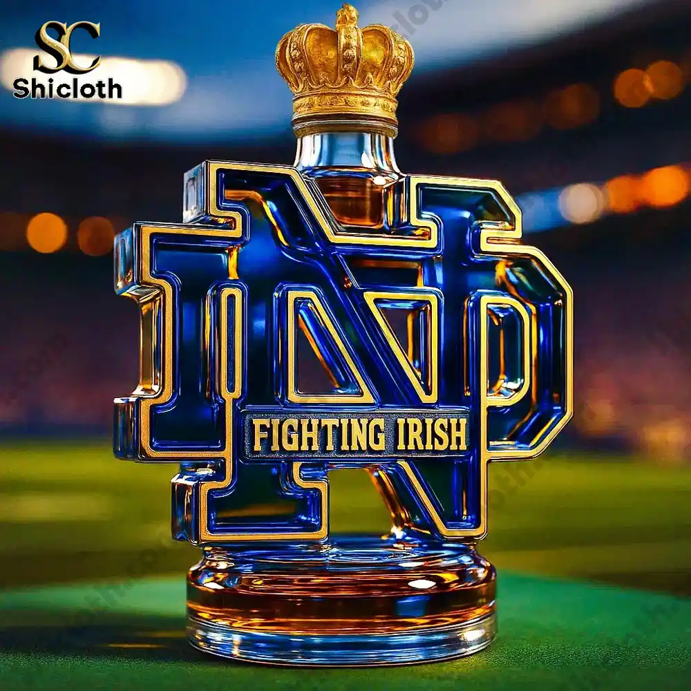 Notre Dame shaped bottle with a crown top on a stadium field!