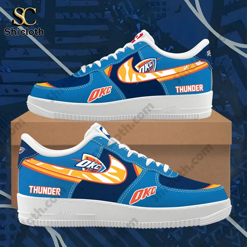 Alt text: Blue Oklahoma City Thunder themed sneakers displayed on a box against a dark blue background!