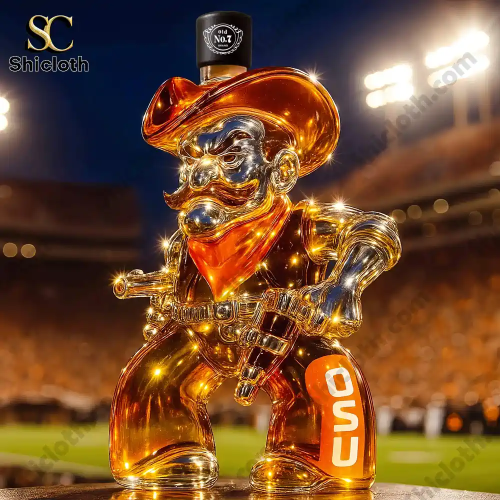 Oklahoma State Cowboys Christmas Whiskey Bottle 3 An orange OSU cowboy shaped bottle with a black cap in a stadium background.