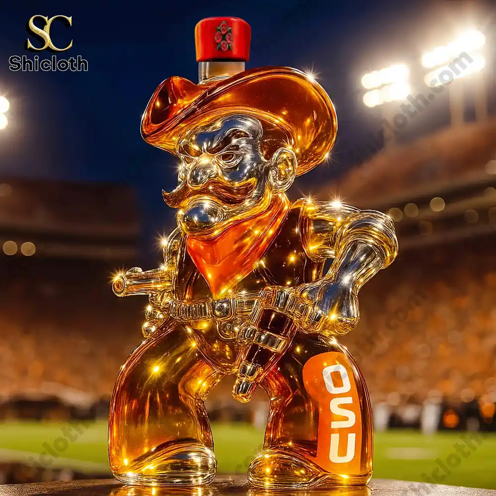 Oklahoma State Cowboys Christmas Whiskey Bottle 7 An orange OSU cowboy shaped bottle with a patterned red cap in a stadium.
