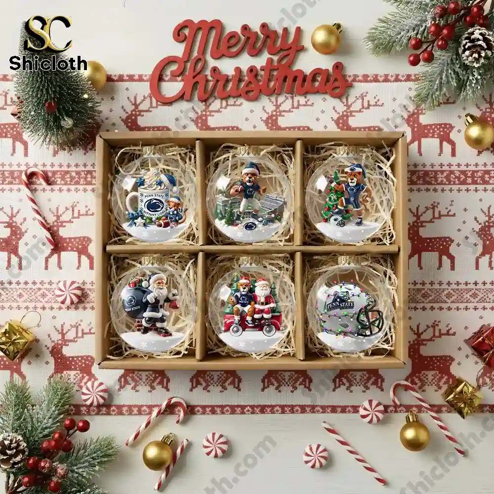 Boxed set of six Penn State themed Christmas ornaments arranged in compartments.