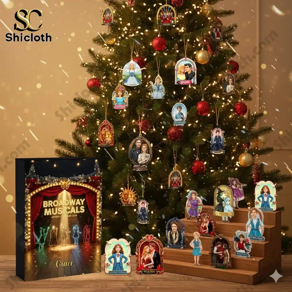 Full view of a decorated Christmas tree with Broadway Musicals advent calendar box and musical character ornaments.