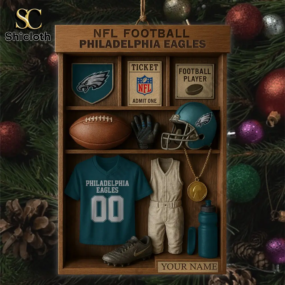 Philadelphia Eagles NFL Football Locker Customizable Hanging Ornament 5 Philadelphia Eagles themed ornament with football items and jersey inside a display box.