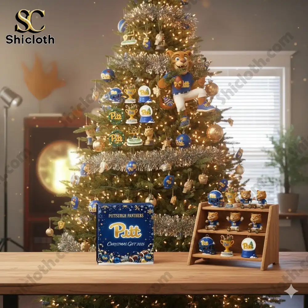 A Christmas tree decorated with Pitt themed ornaments and a panther mascot topper.