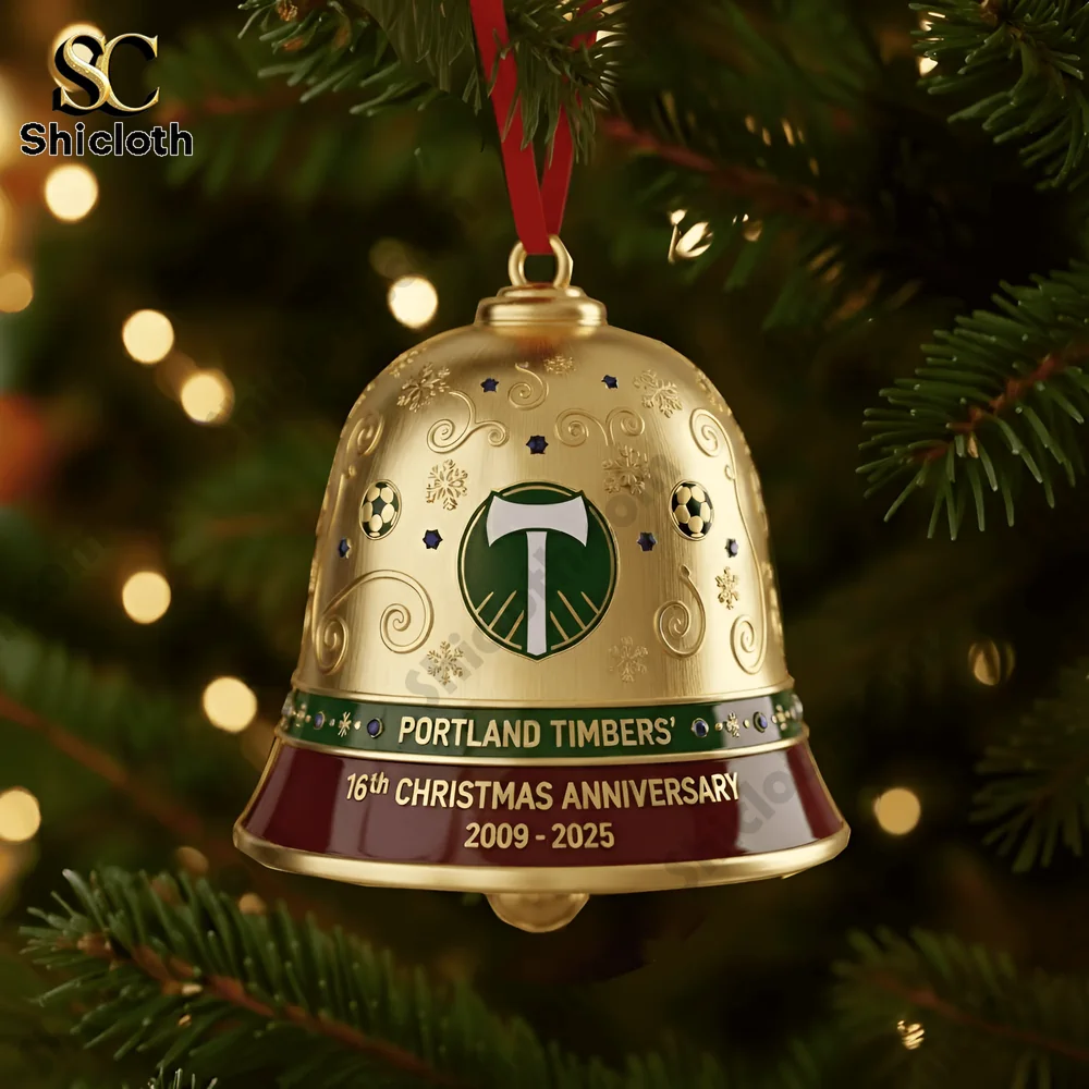 Close-up of a Portland Timbers 16th Anniversary golden Christmas bell ornament hanging on a Christmas tree.