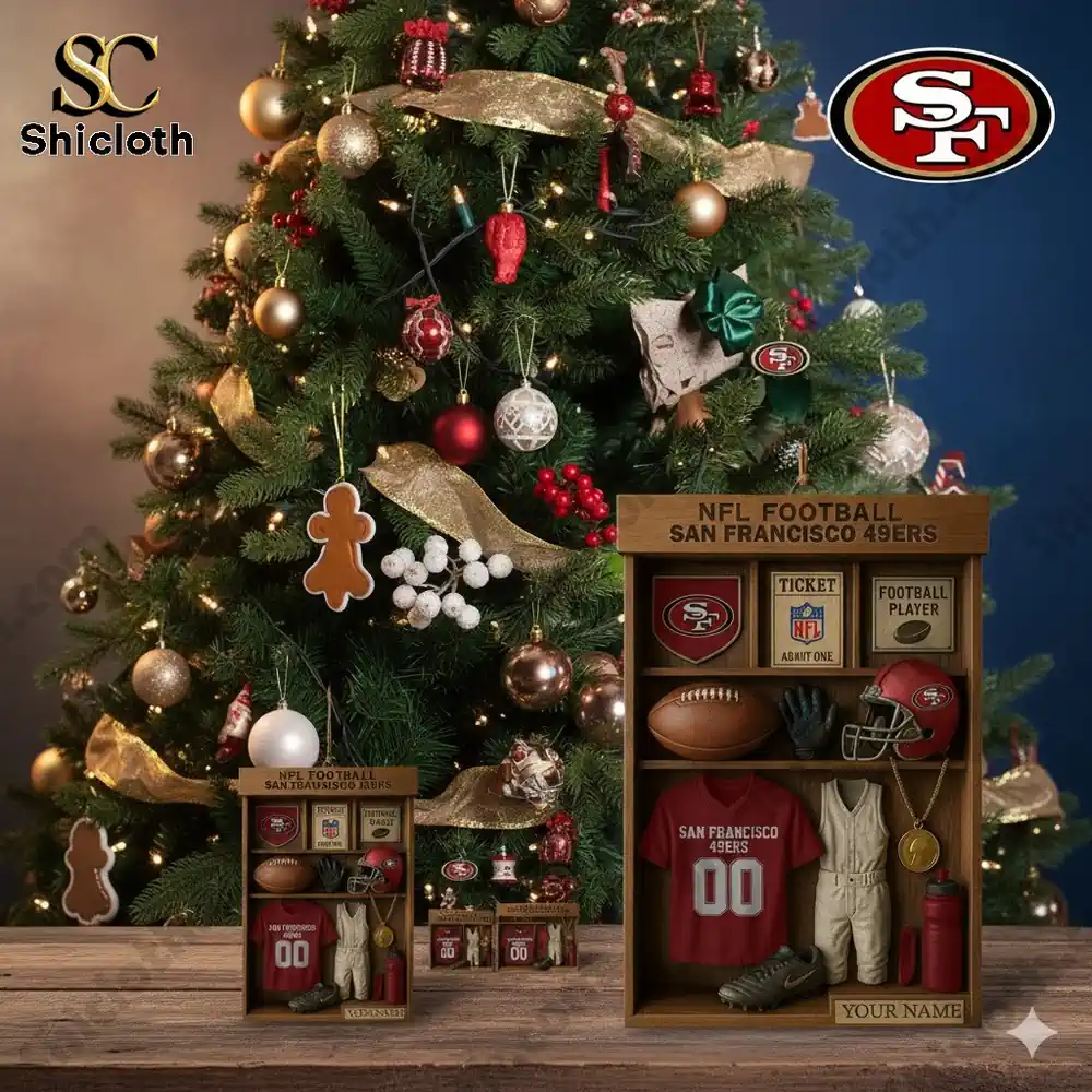 Christmas tree scene featuring a San Francisco 49ers themed miniature display box with football gear.