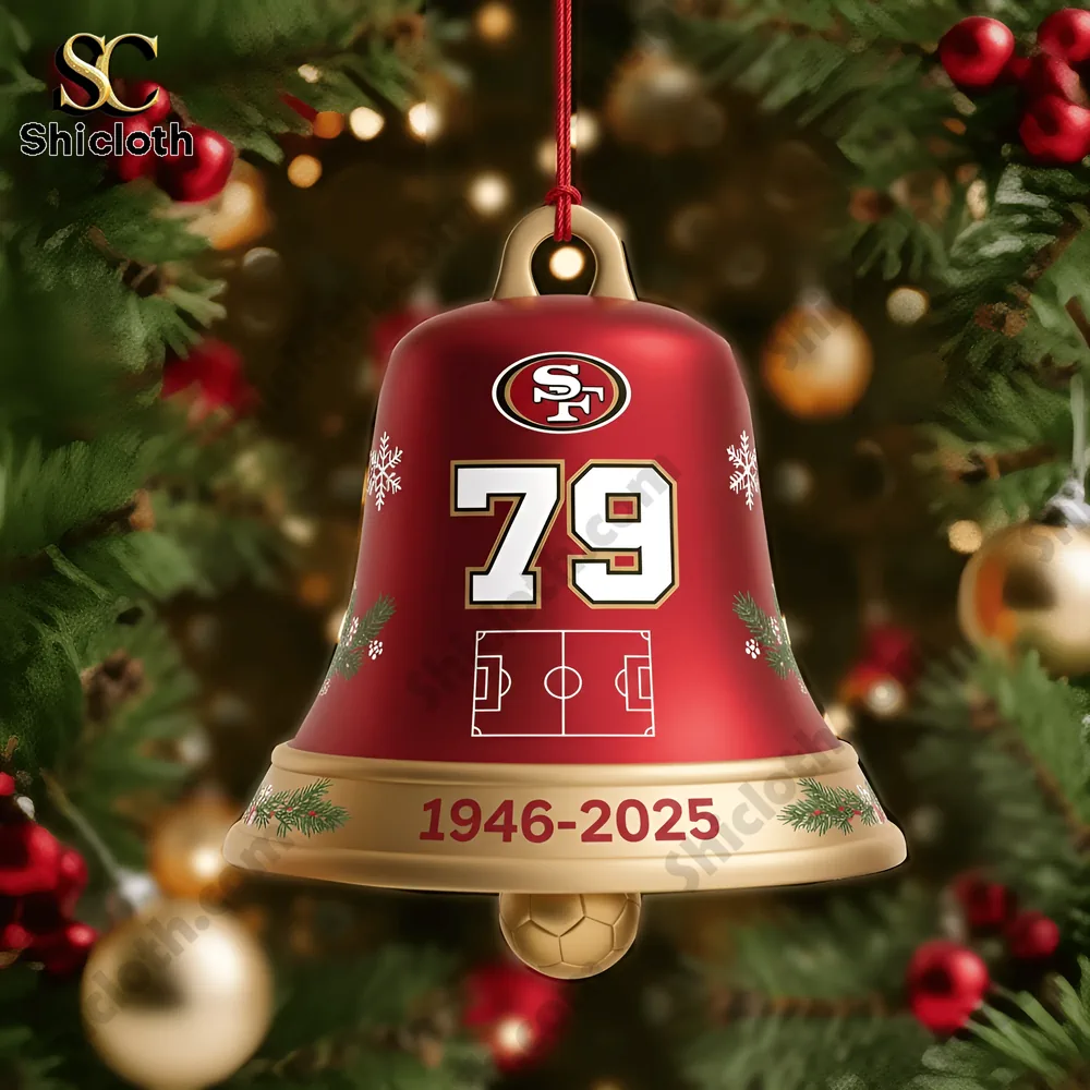Close-up of San Francisco 49ers 79th Anniversary red Christmas bell ornament hanging on a Christmas tree.
