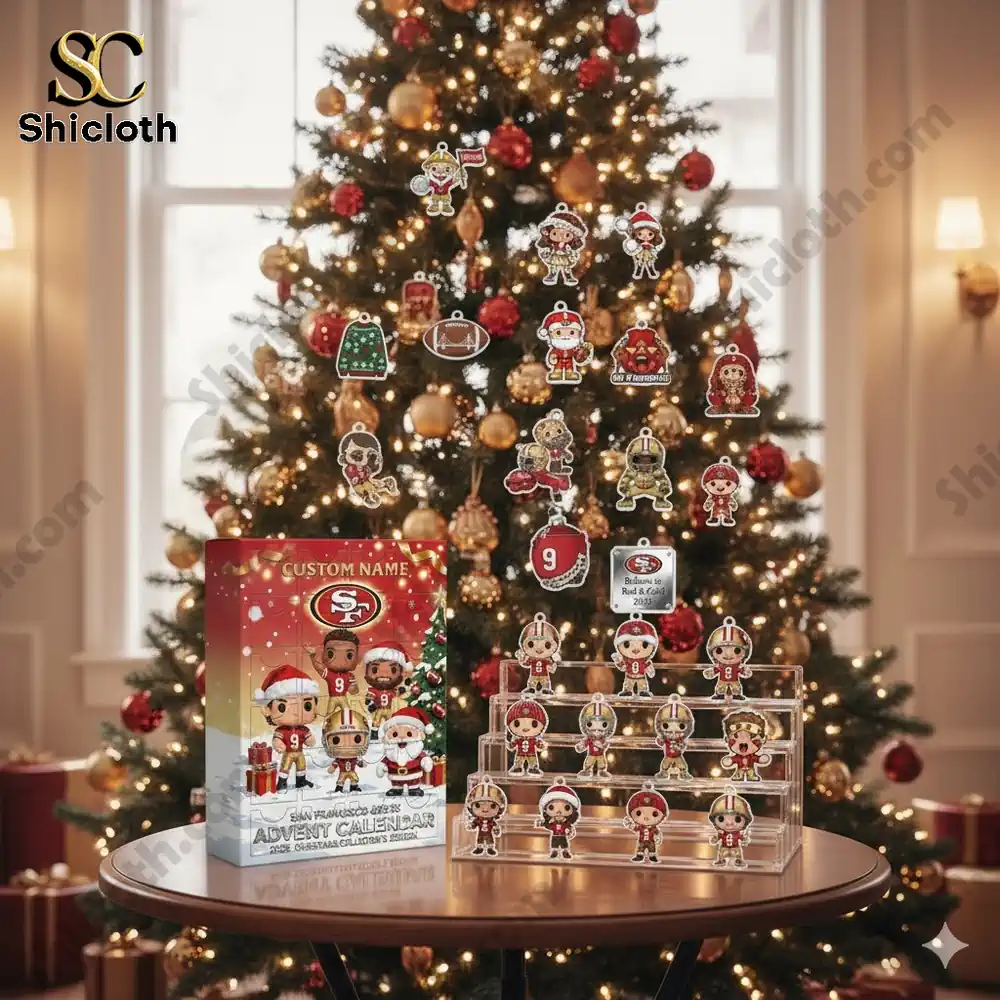 San Francisco 49ers Christmas advent calendar with mini collectible figures displayed near a decorated Christmas tree.