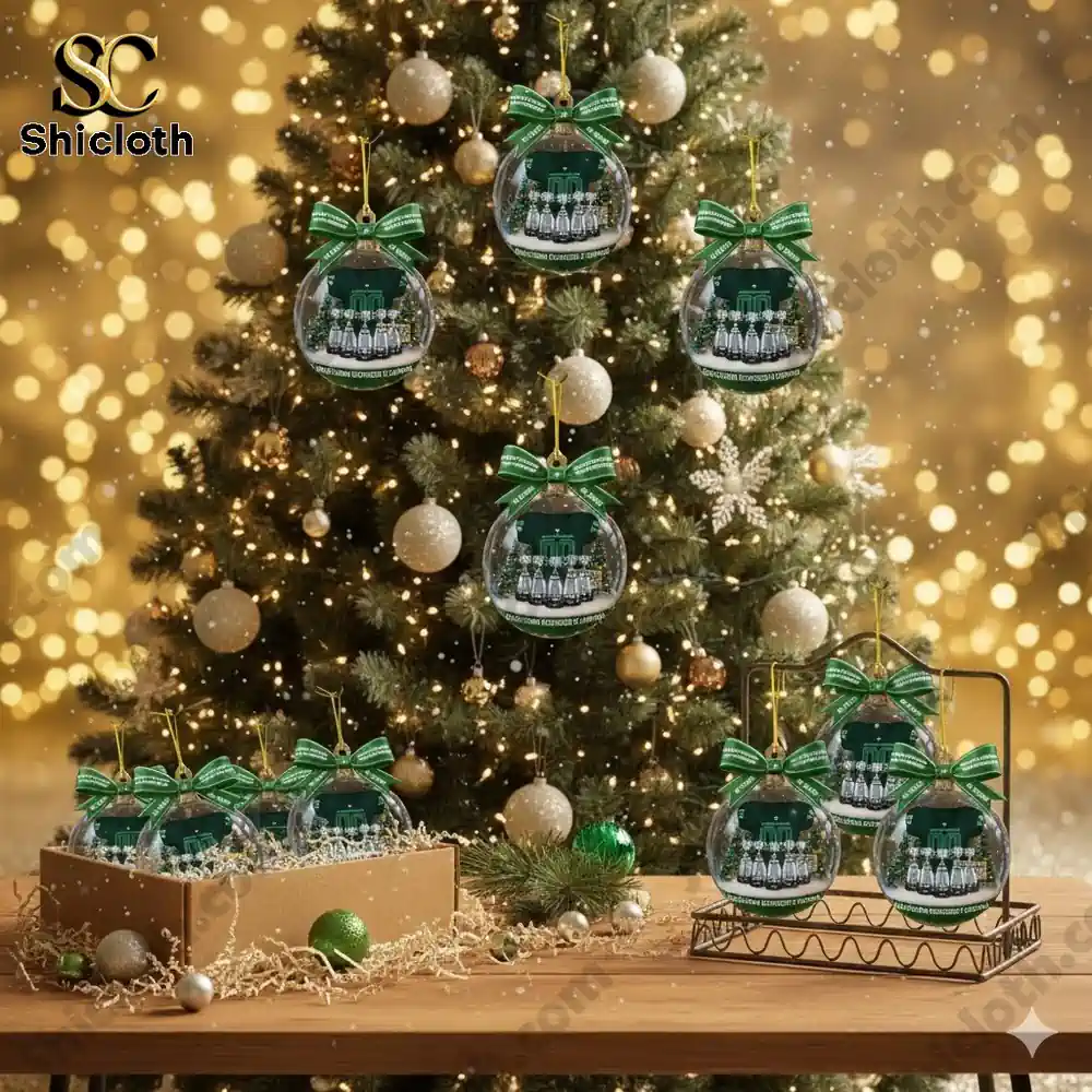 Christmas tree decorated with clear ornaments featuring Saskatchewan Roughriders designs.