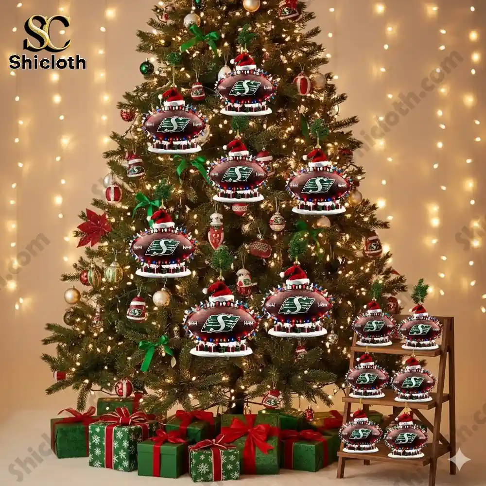 Christmas tree decorated with multiple Saskatchewan Roughriders football ornaments.