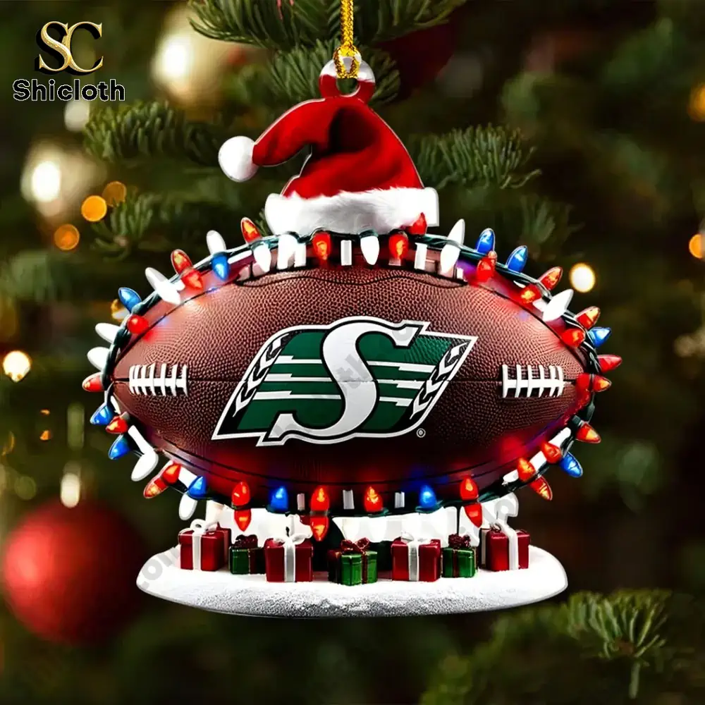 Saskatchewan Roughriders Christmas Rugby Acrylic Ornament 4 Roughriders football ornament hanging on a Christmas tree.