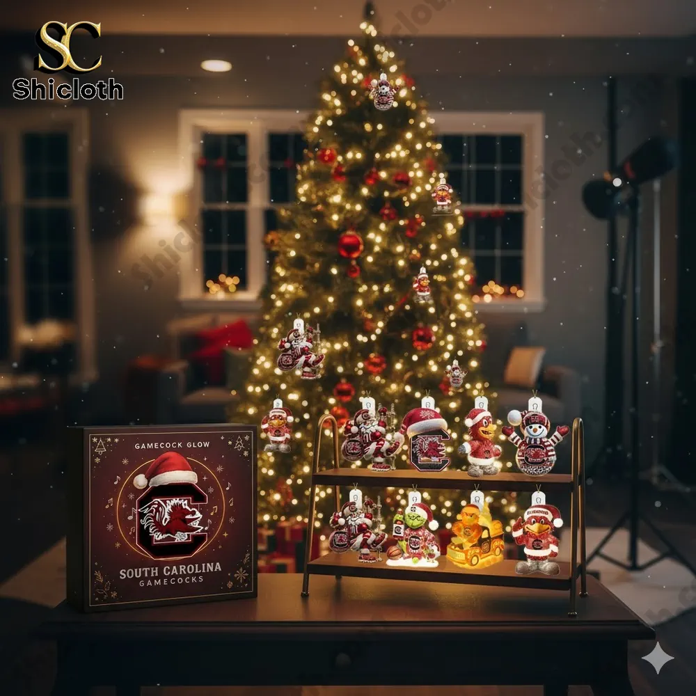Christmas tree with South Carolina Gamecocks themed ornaments displayed on a table.