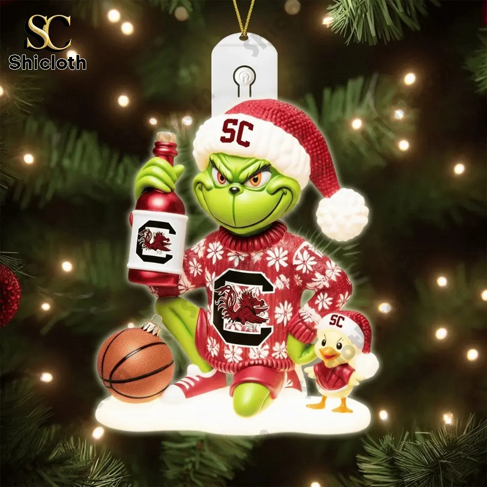 South Carolina Gamecocks Christmas Tree Topper And Ornament Set Gift Set 2025 5 Small SC themed holiday figurines placed in a cozy Christmas room.