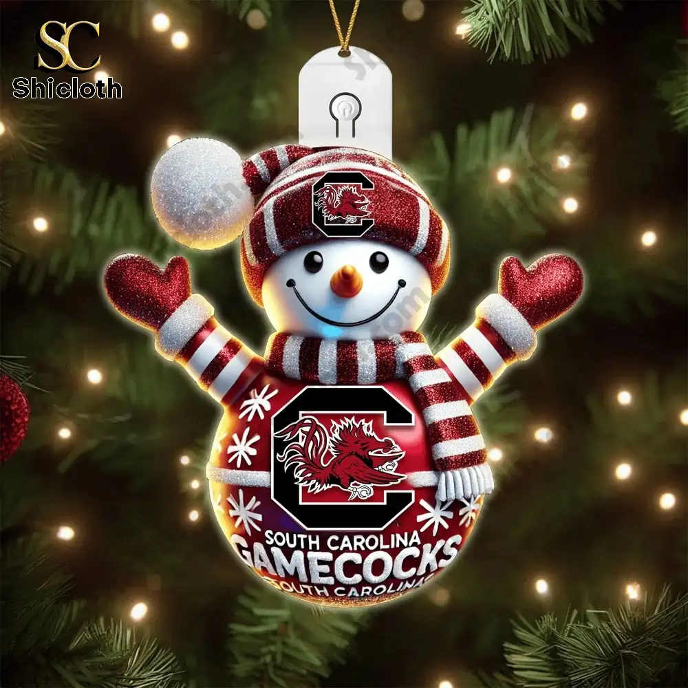 South Carolina Gamecocks Christmas Tree Topper And Ornament Set Gift Set 2025 6 Various SC character ornaments glowing beside a Christmas setup.