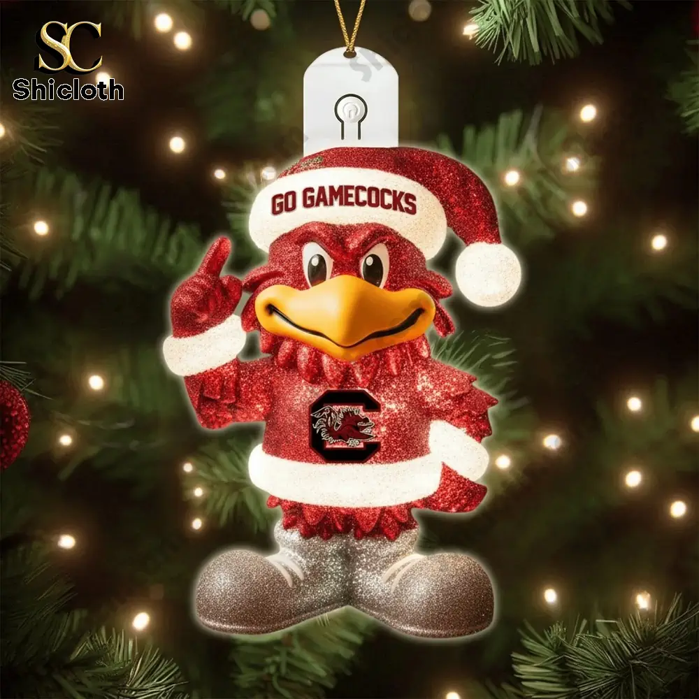 South Carolina Gamecocks Christmas Tree Topper And Ornament Set Gift Set 2025 9 Cute SC themed holiday ornaments displayed in a festive room.