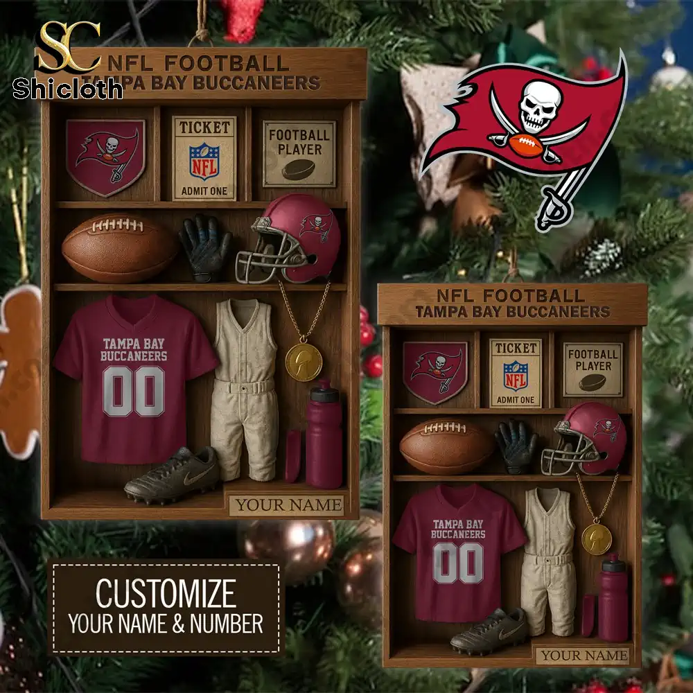Closeup of a customizable Tampa Bay Buccaneers ornament with football gear and jersey inside a wooden display box!