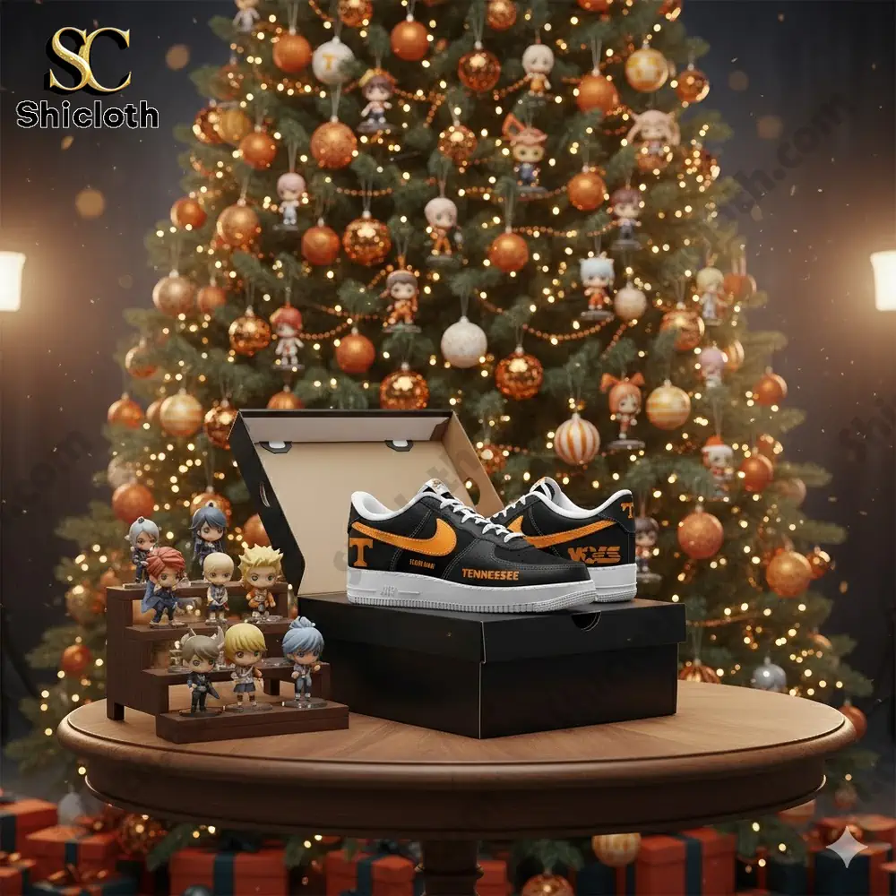 Custom Tennessee themed sneakers displayed on a table in front of a decorated Christmas tree!