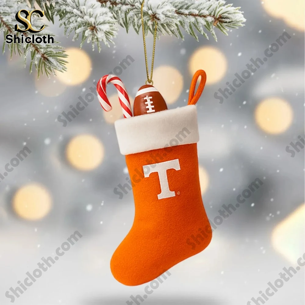 Tennessee Volunteers 2025 Christmas Tree Topper And Ornament Set 3 An orange Christmas stocking with Tennessee Volunteers branding filled with holiday treats.