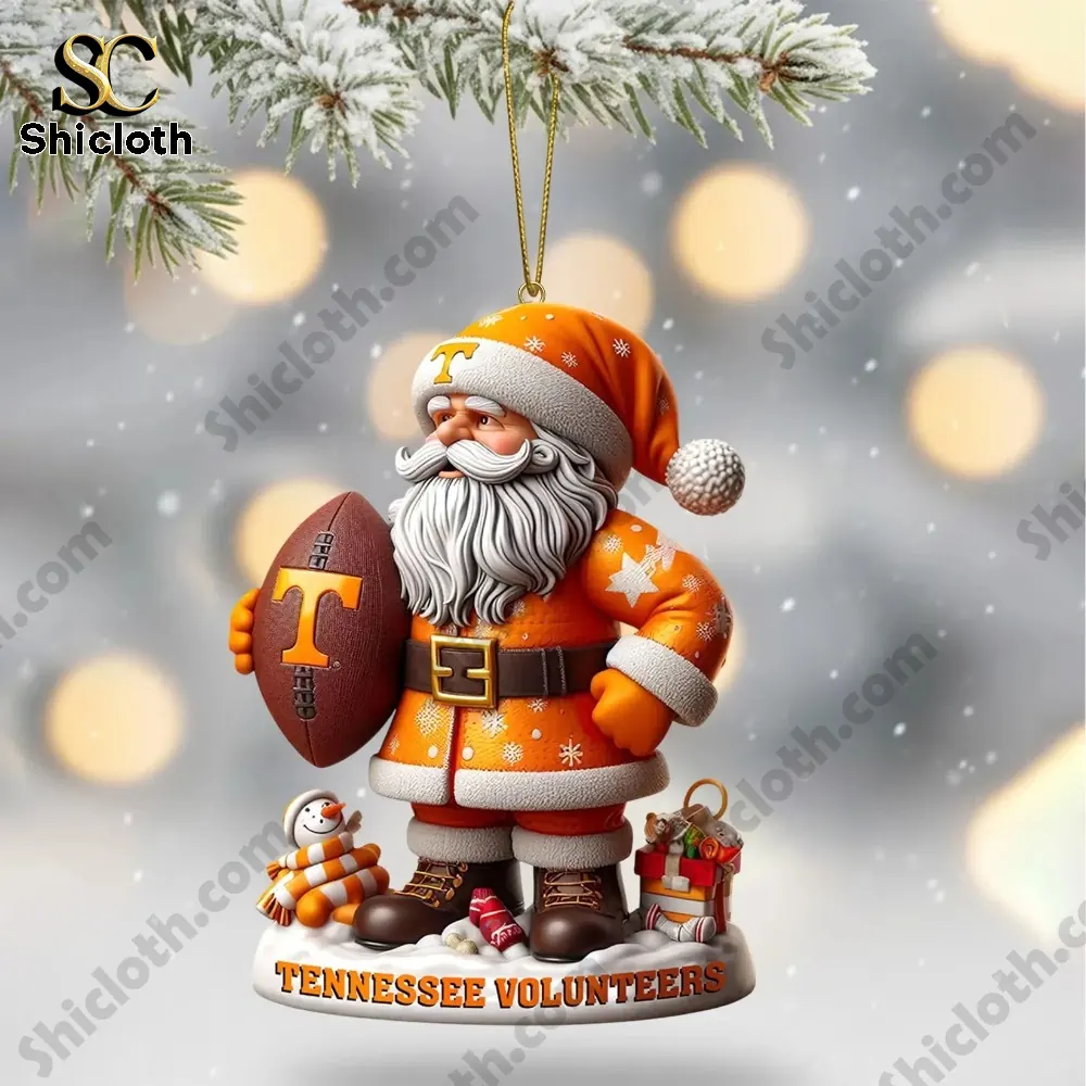 Tennessee Volunteers 2025 Christmas Tree Topper And Ornament Set 5 A Santa figure dressed in orange Tennessee Volunteers clothing holding a football.