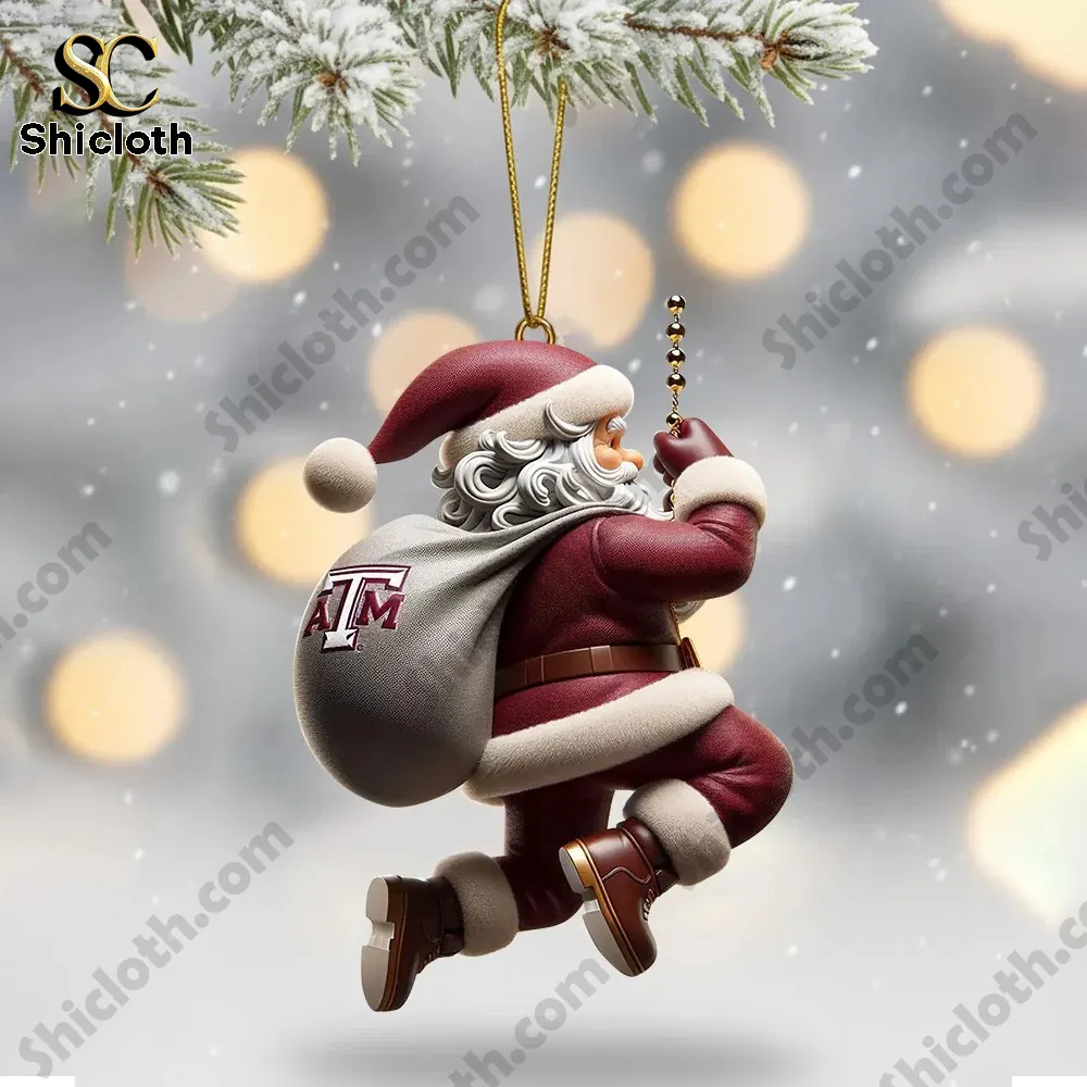 Santa ornament wearing Texas AM Aggies colors climbing with a gift bag.