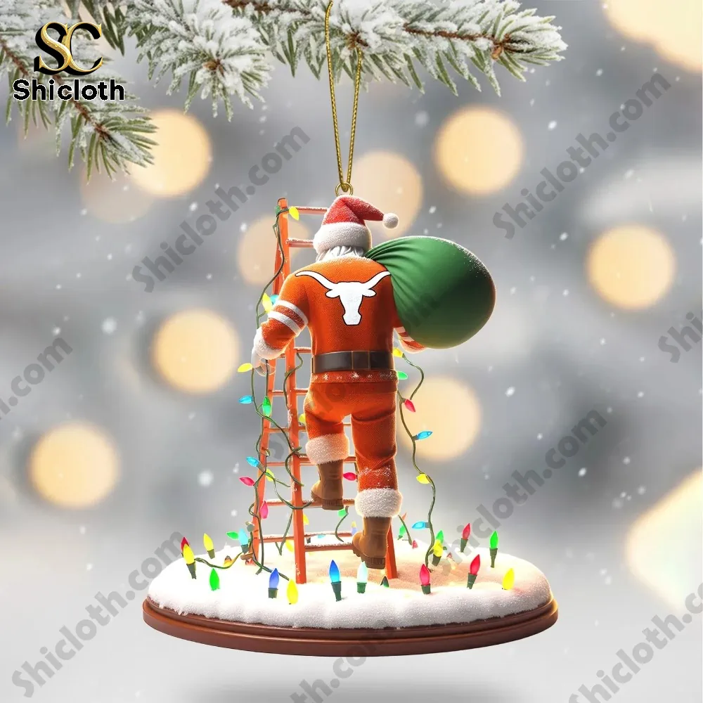 Santa figure in orange climbs a light covered ladder with a gift sack on a snowy base!