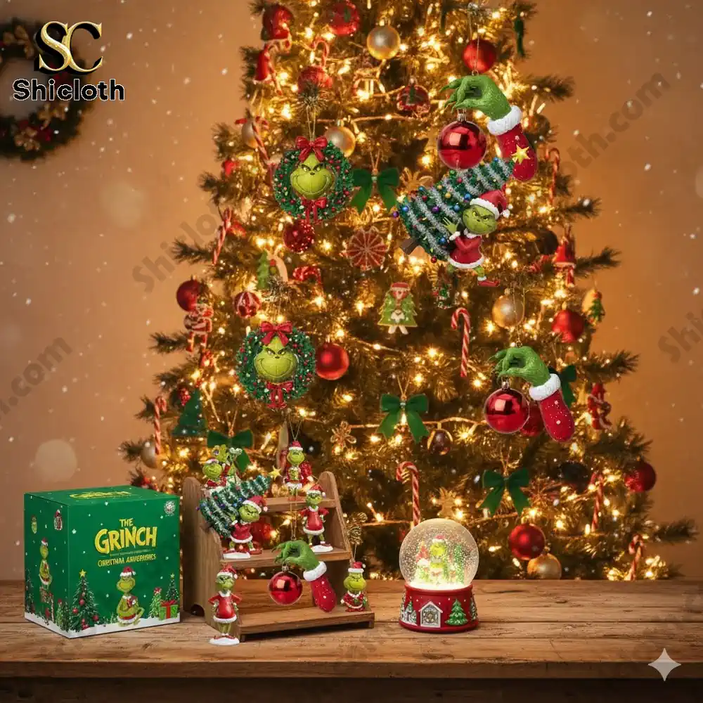 Christmas tree decorated with green character ornaments and a display of matching holiday items on a table!