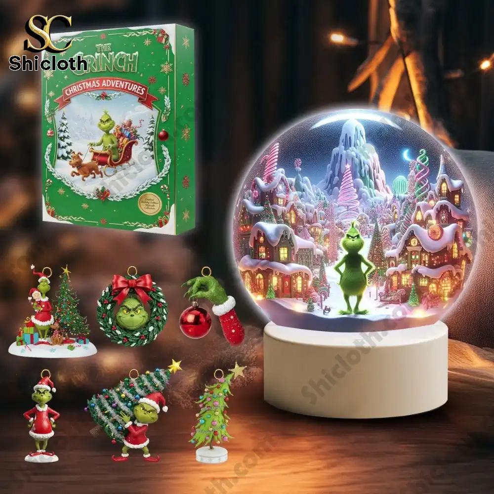 The Grinch Christmas 2025 Snowball Led Light And Ornament Set 8 Holiday ornament set and glowing snow globe with green character next to product box!