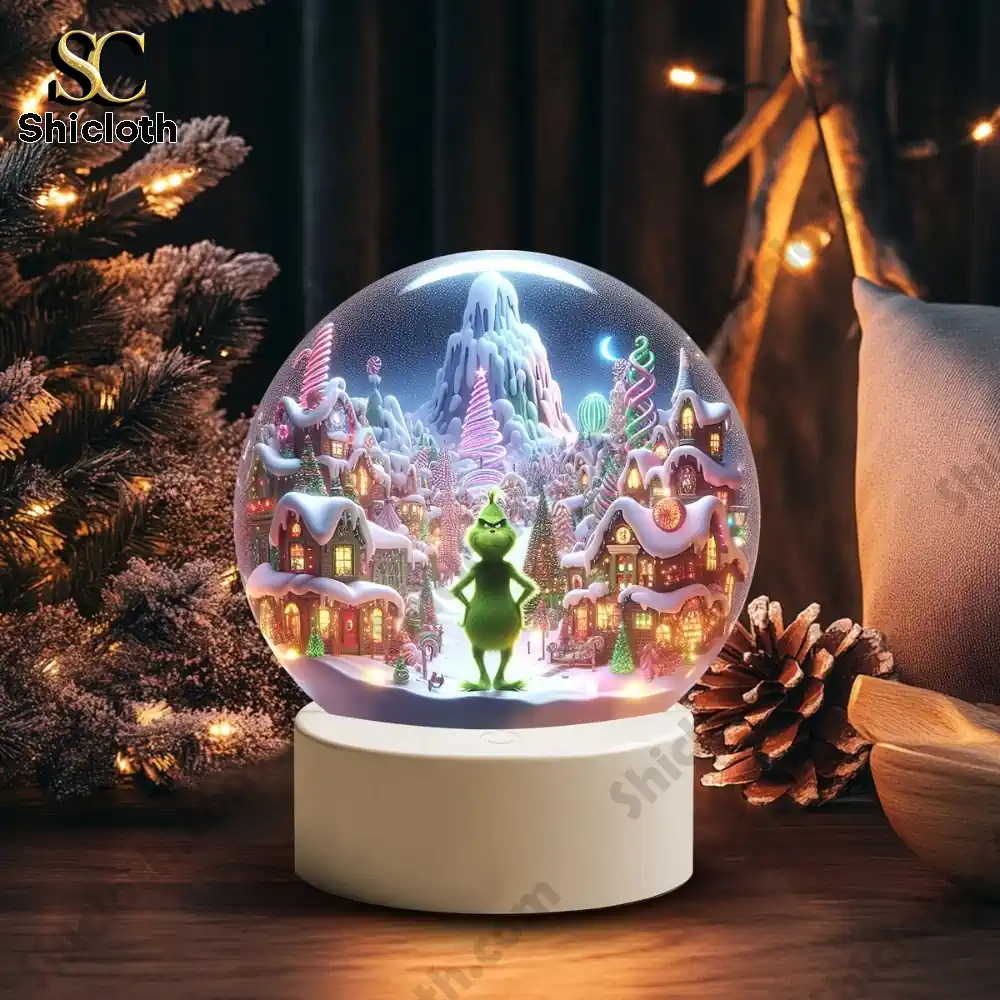 The Grinch Christmas 2025 Snowball Led Light And Ornament Set 9 Glowing snow globe with winter village and green character inside!
