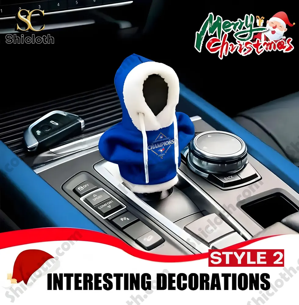 Toronto Blue Jays Mini Hoodie Gear Shift Cover 3 Blue mini hoodie with white fur trim and American League Champions 2025 logo on a car gear shift decorated for Christmas!