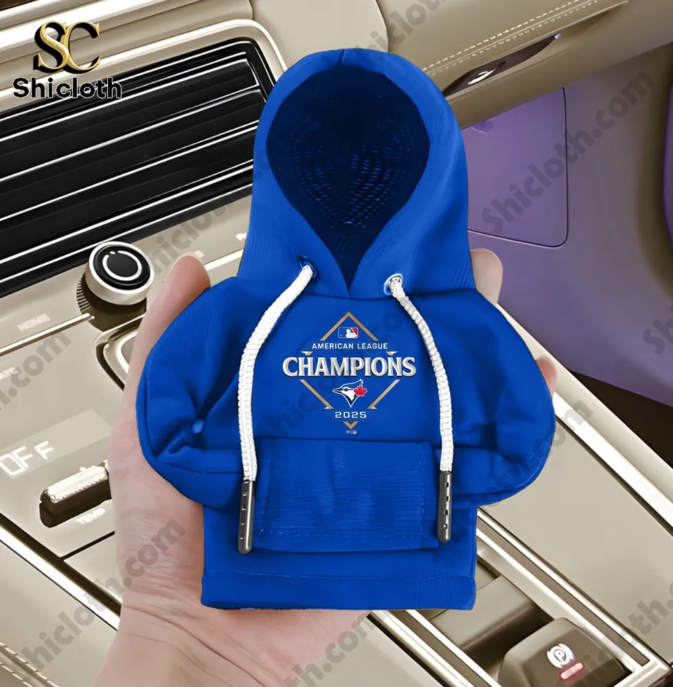 Toronto Blue Jays Mini Hoodie Gear Shift Cover 4 Close up of a blue mini hoodie with white fur trim featuring American League Champions 2025 logo on a car gear shift!