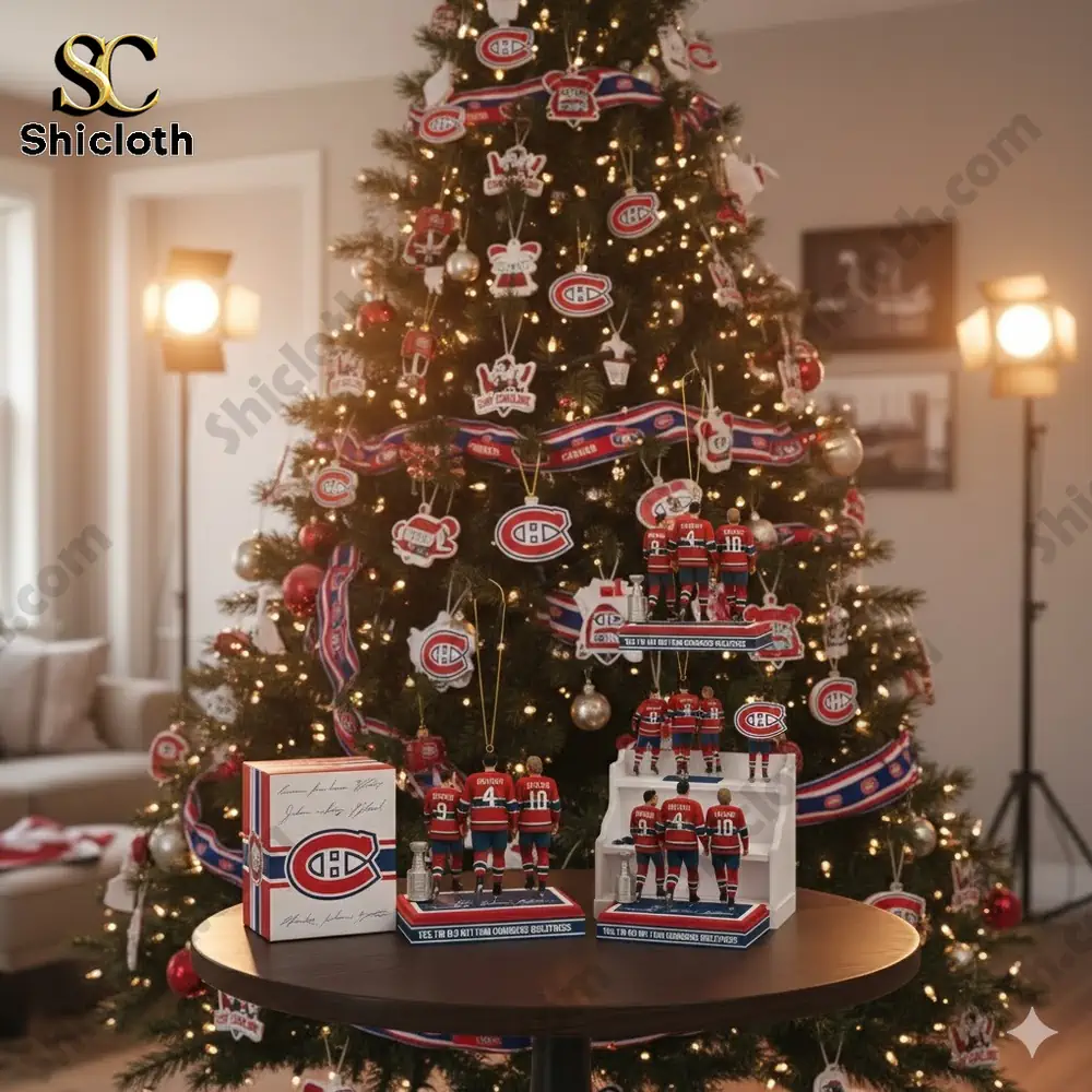 Christmas tree with Montreal Canadiens ornaments and figurines under it.