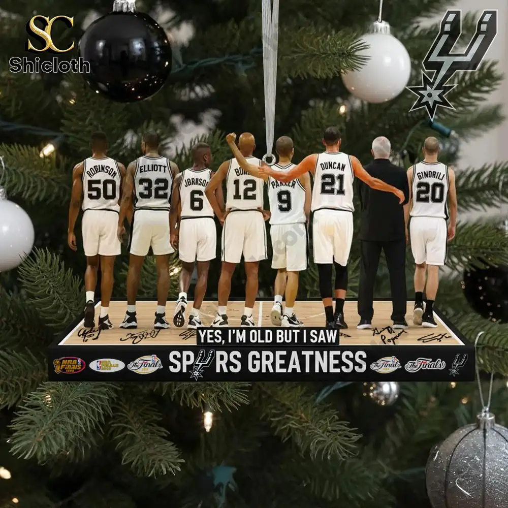 Close-up view of the San Antonio Spurs players ornament, showcasing the iconic lineup of players and coach, displayed on a Christmas tree.