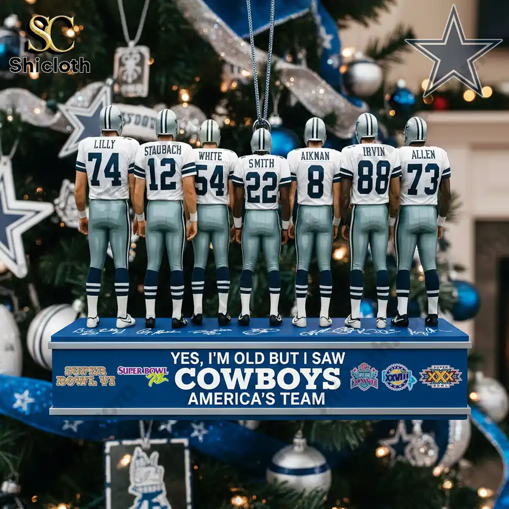 Close-up of Dallas Cowboys figurines with player names on a base, showcasing legendary players.