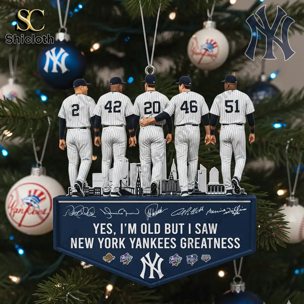 Close-up view of a New York Yankees ornament featuring five legendary players, each in pinstripe uniforms.