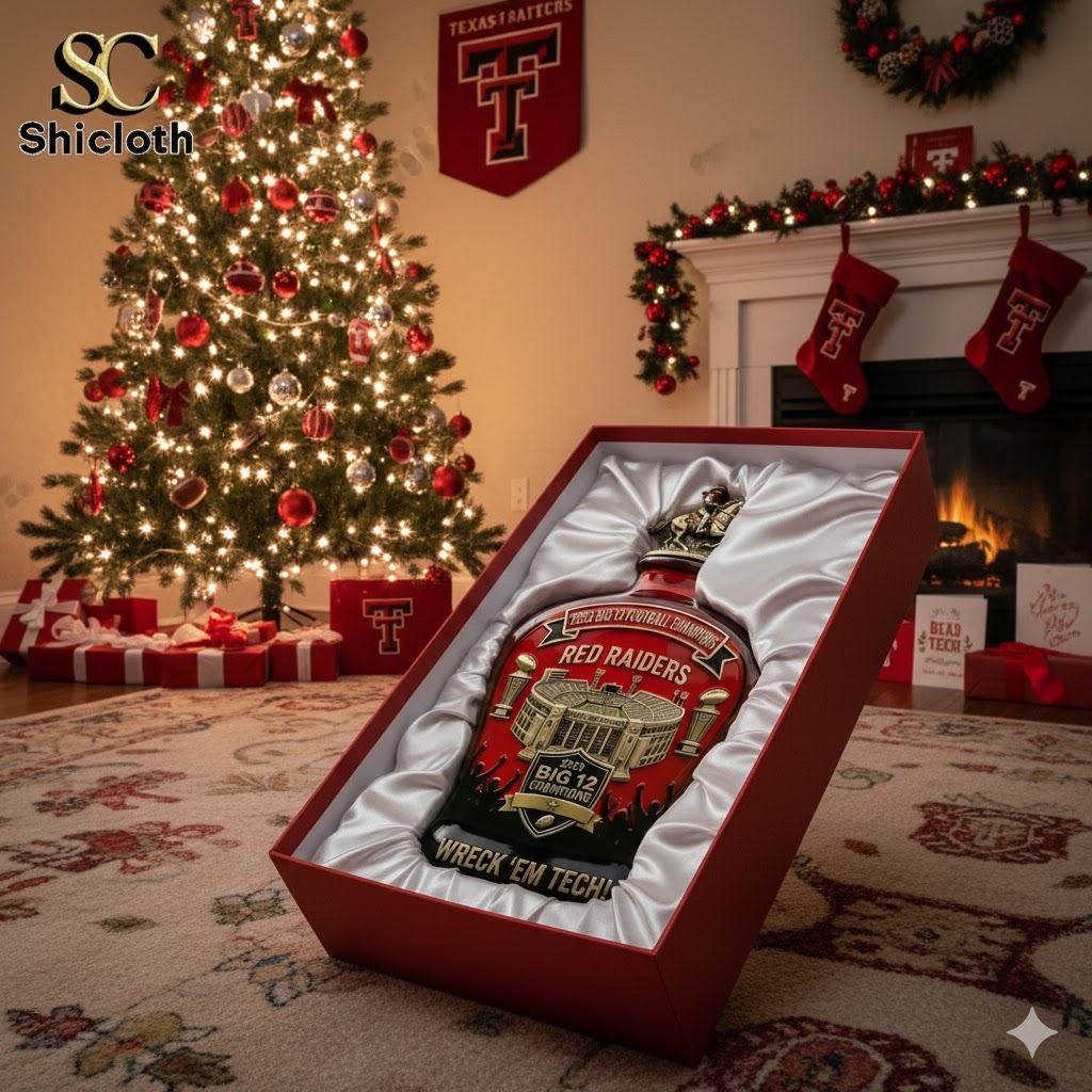 A commemorative whiskey decanter in a Christmas setting with a Texas Tech Red Raiders theme.