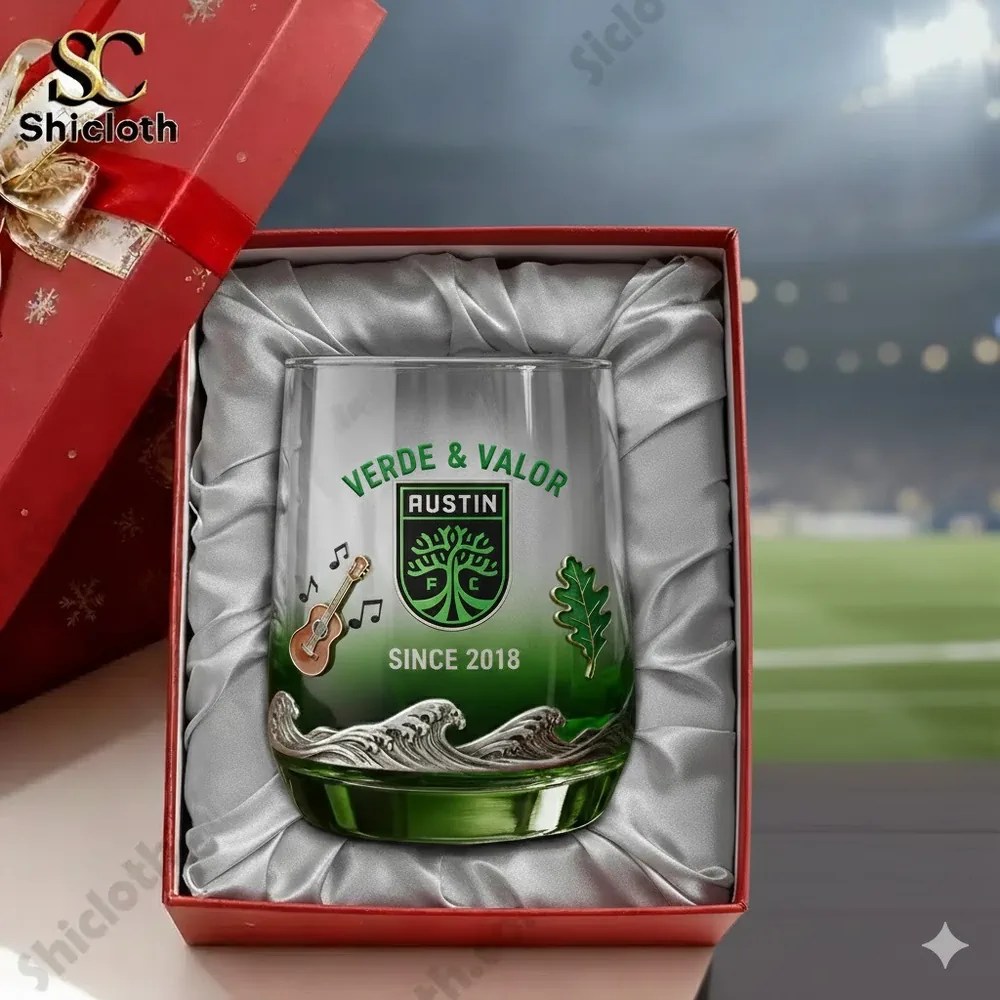 An Austin FC themed glass presented in a cushioned gift box.
