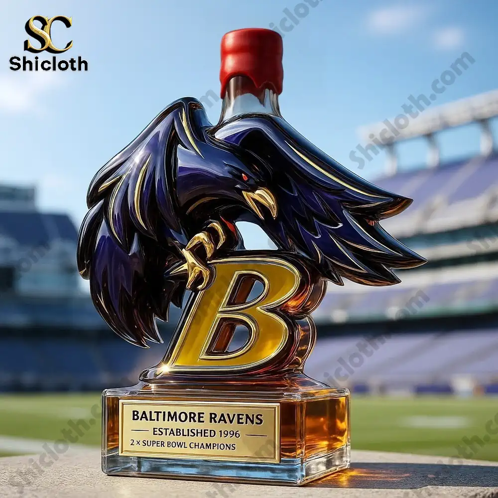 A sculpted Baltimore Ravens bottle featuring a raven and a bold letter B placed outdoors near a stadium.