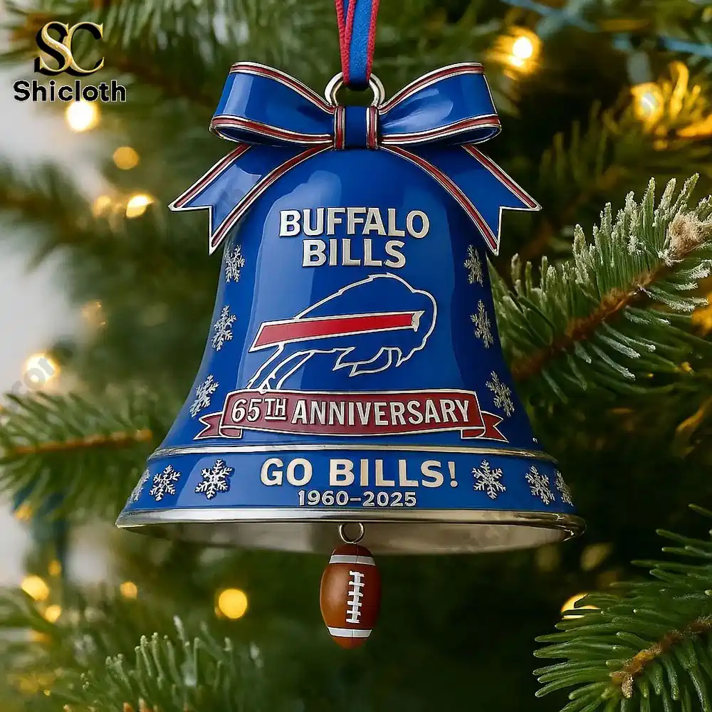 A close view of a blue Buffalo Bills anniversary bell ornament hanging on a Christmas tree.